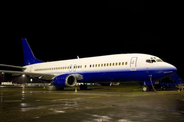 Boeing 737-400 group charter plane on the runway