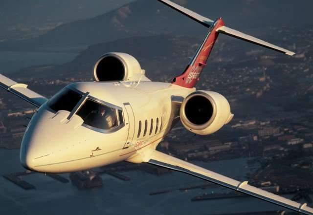 Lear 45 Jet Flying Over Mountains | Stratos Jets