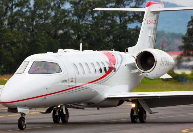 Lear 75 Private Jet On Runway | Stratos Jets Charters, Inc.