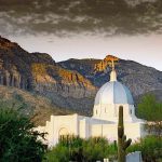 Cathedral with Desert Mountains in Background in Tucson, Arizona |