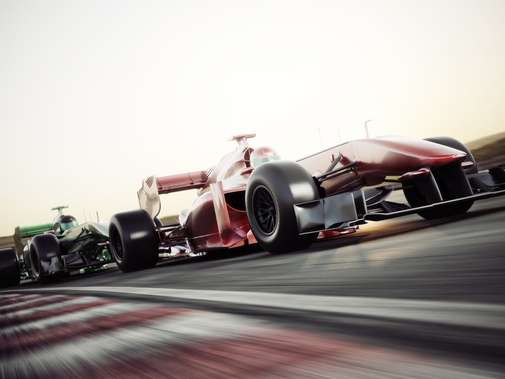 A Formula One racing car speeding around a track.