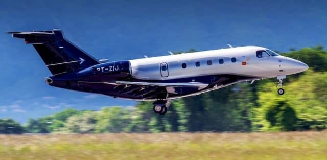 Embraer Legacy 450 Taking off On Runway | Stratos Jets Charters, Inc.