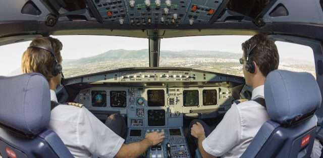 jet charter pilots in cockpit