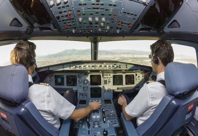 jet charter pilots in cockpit