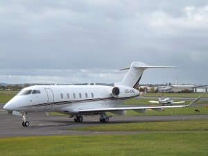 Exterior of White Bombardier Challenger 350 on Runway