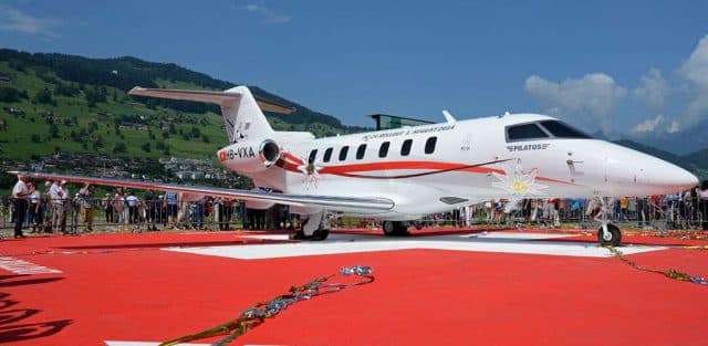 Pilatus PC-24 Being Observed by Crowd in Fenced-in Area