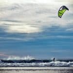 Paraglider Above Beach in Lompoc, CA | Stratos Jet Charters, Inc.