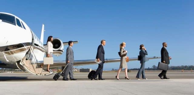 corporate team leave private jet