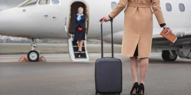 woman boarding private plane