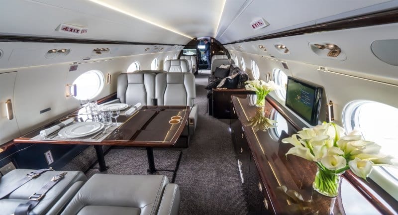 The luxurious interior of a large private airplane.
