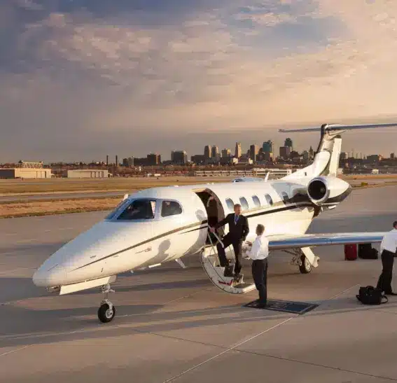 Man in Suit Boarding Small Private Jet | Stratos Jets