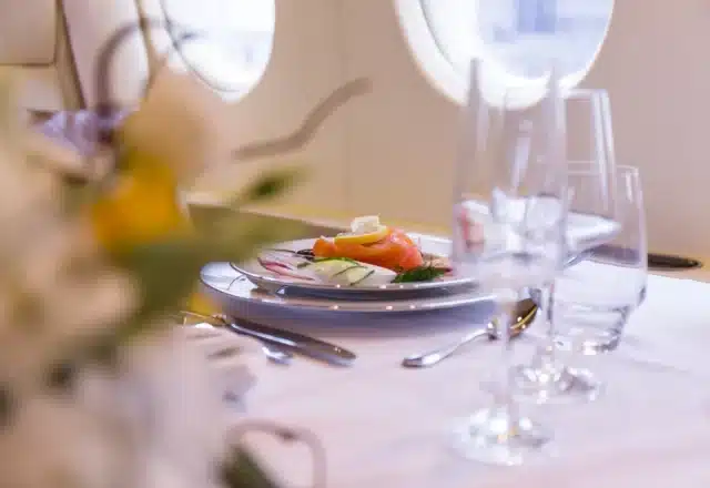 A view of a fine-dining setup on a private jet.