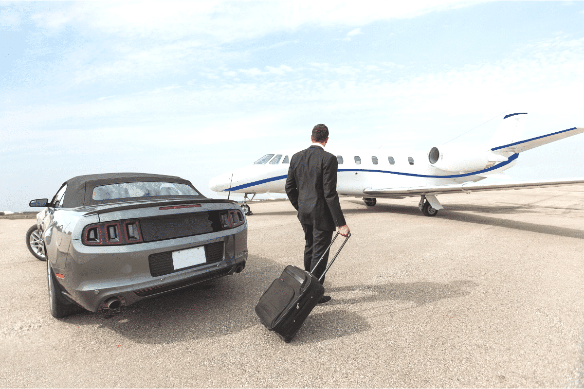 Executive traveler boarding a private jet
